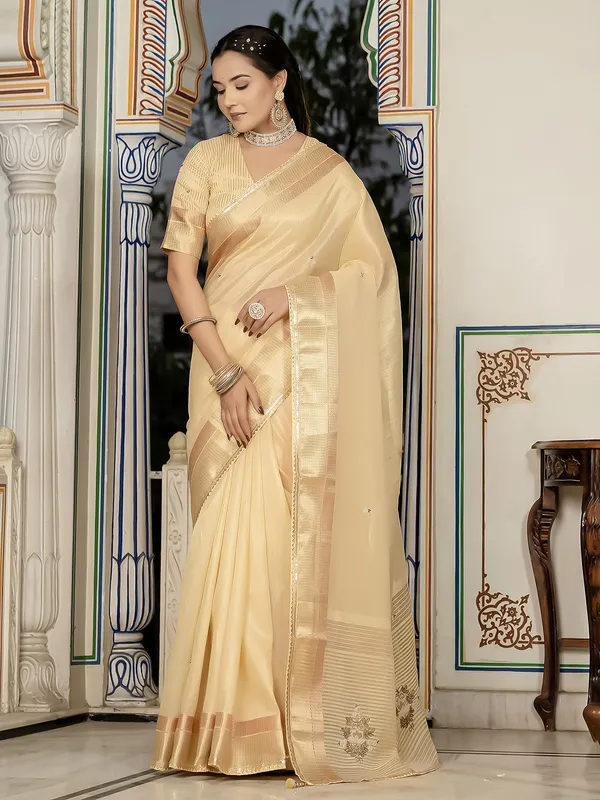 Yellow tissue silk saree with unstitched blouse