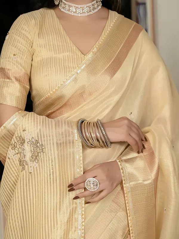 Yellow tissue silk saree with unstitched blouse