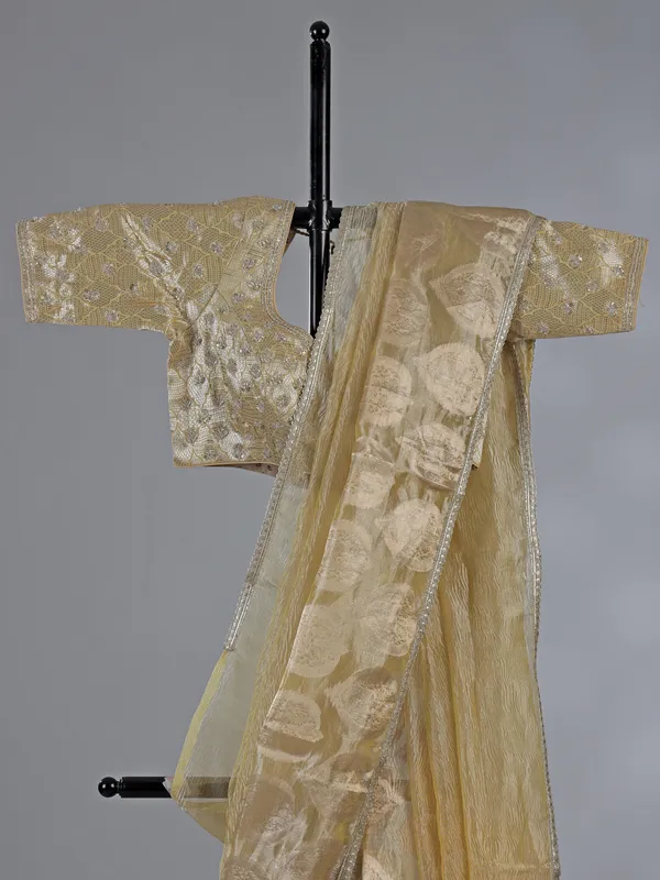 Yellow tissue silk saree with zardosi work