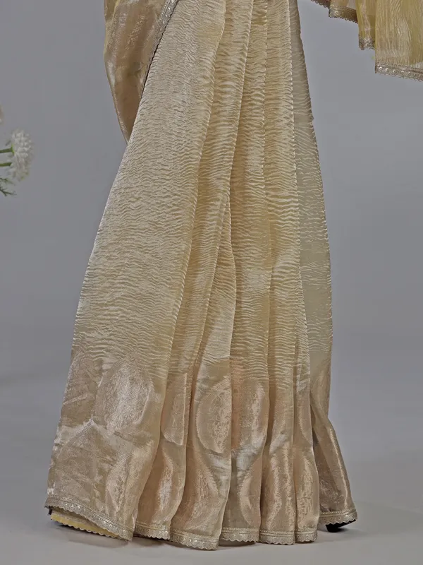 Yellow tissue silk saree with zardosi work