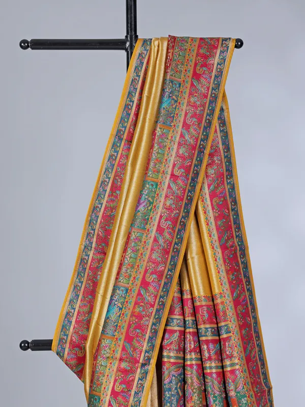 Yellow tissue silk wedding wear with colorful motif weaving