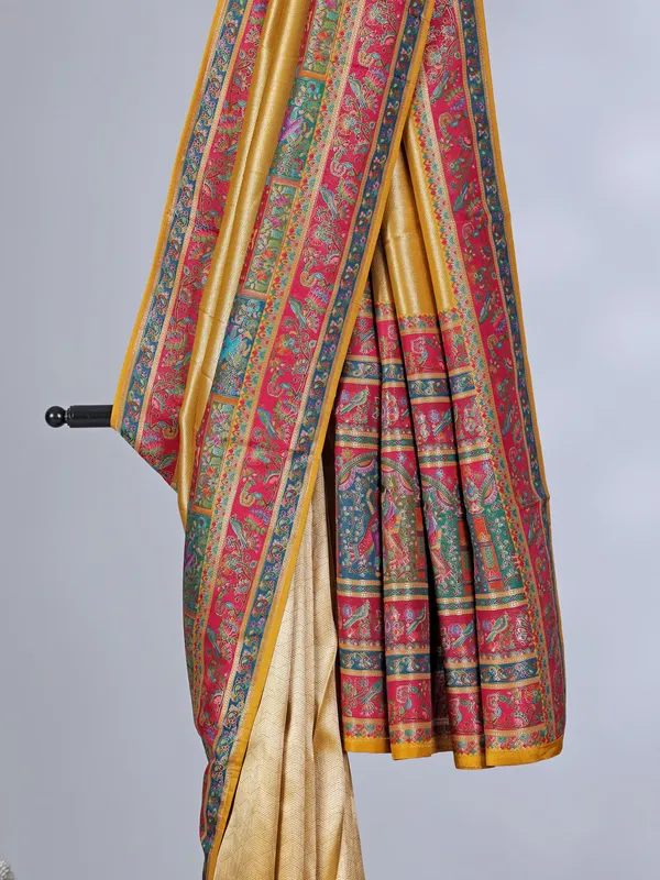 Yellow tissue silk wedding wear with colorful motif weaving