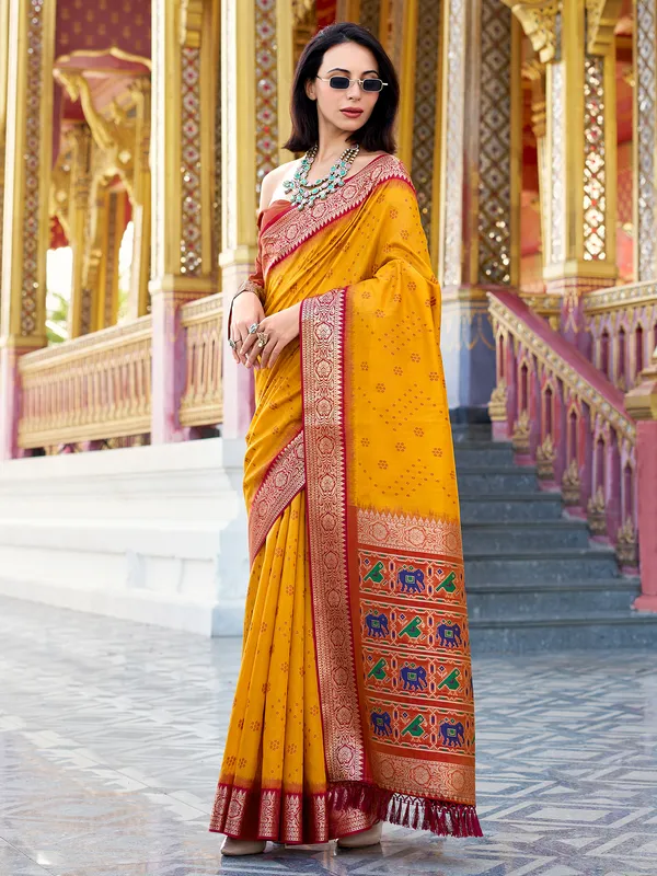Yellow tussar silk saree with woven zari work