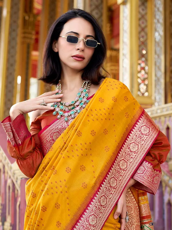 Yellow tussar silk saree with woven zari work