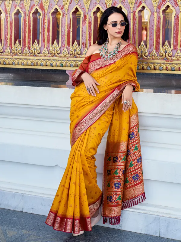 Yellow tussar silk saree with woven zari work