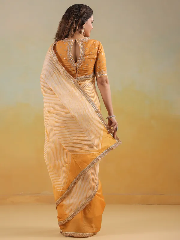 Yellow tusser silk saree with printed