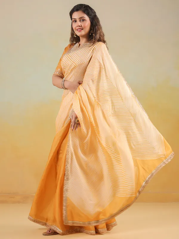 Yellow tusser silk saree with printed