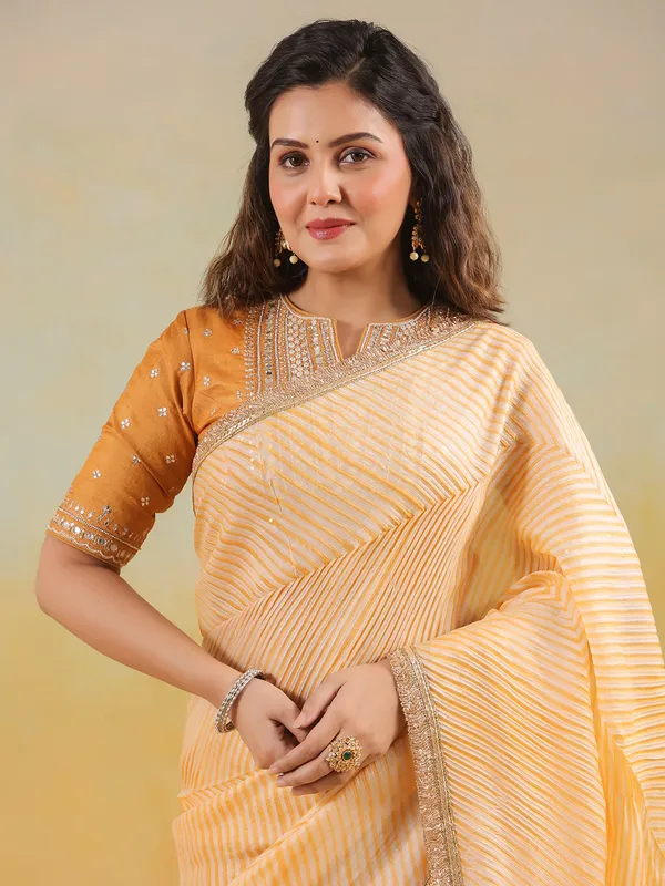 Yellow tusser silk saree with printed