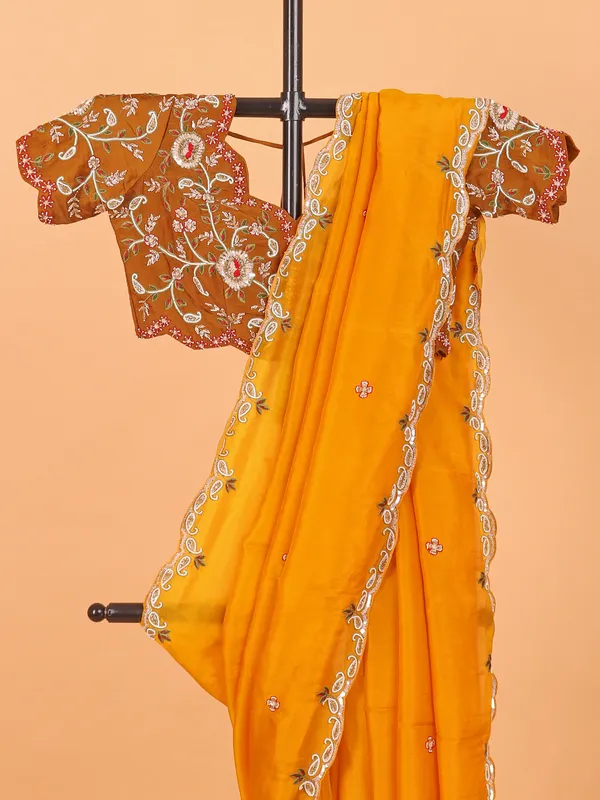Yellow wedding wear tissue silk saree