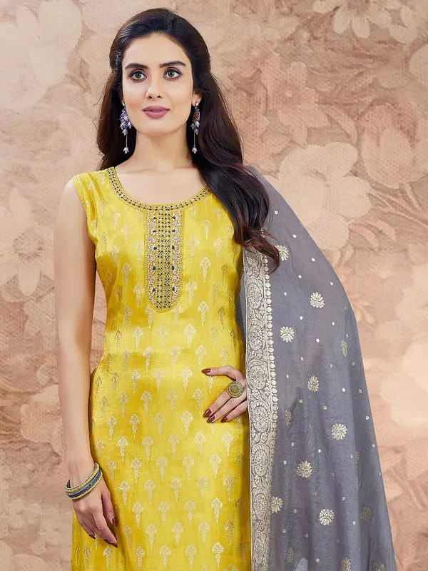 Yellow zari worked silk salwar suit