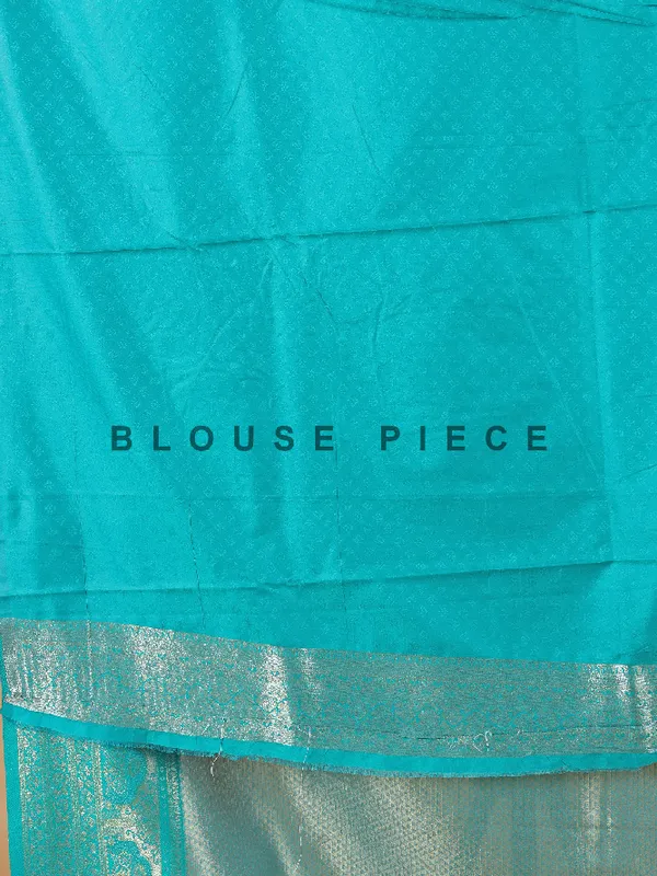 Zari worked aqua silk saree