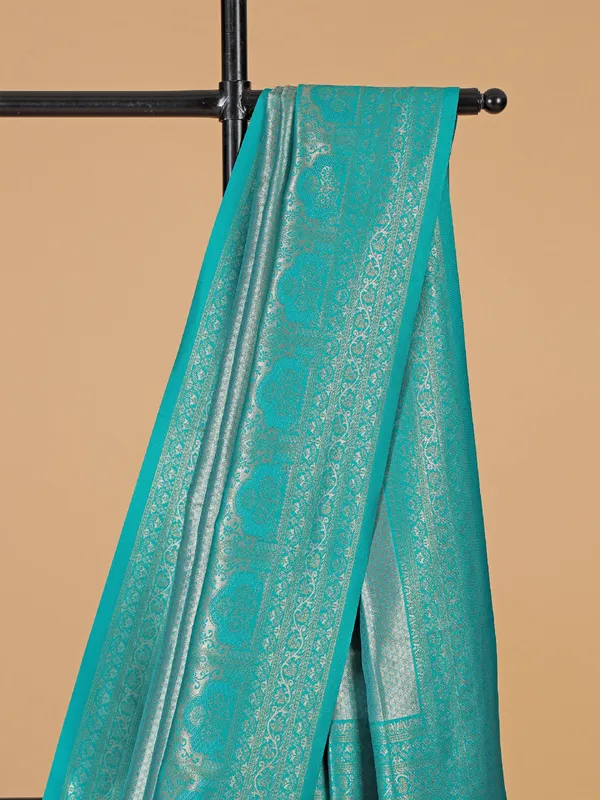 Zari worked aqua silk saree