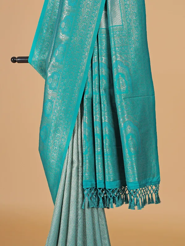 Zari worked aqua silk saree