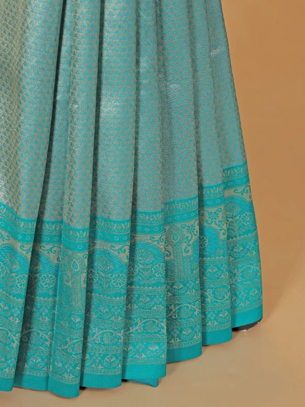 Zari worked aqua silk saree