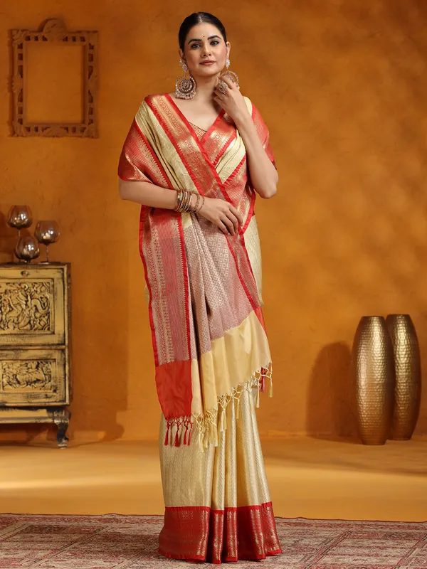 Zari worked beige silk saree