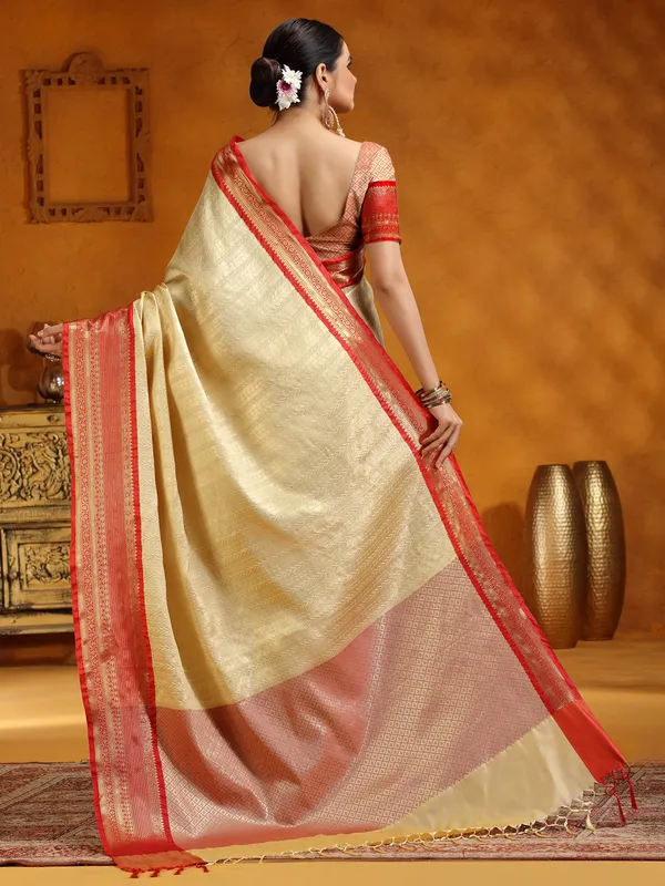 Zari worked beige silk saree