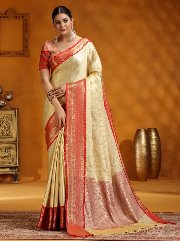 Zari worked beige silk saree
