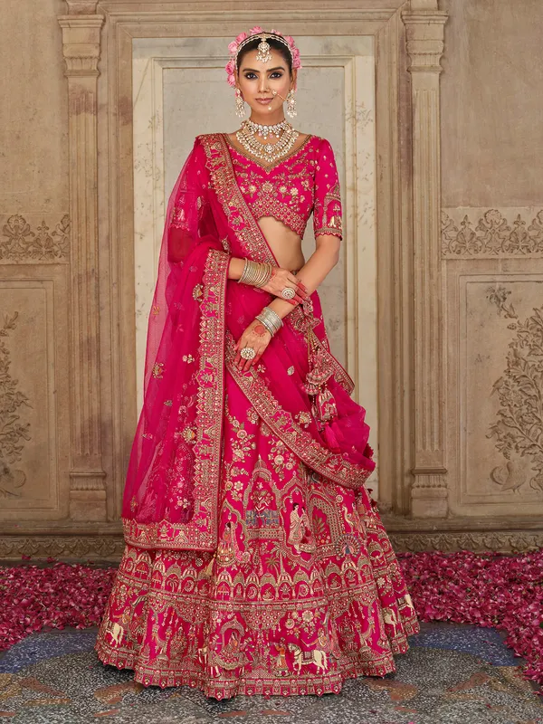 Magenta bridal silk lehenga choli with resham and sequins detailing