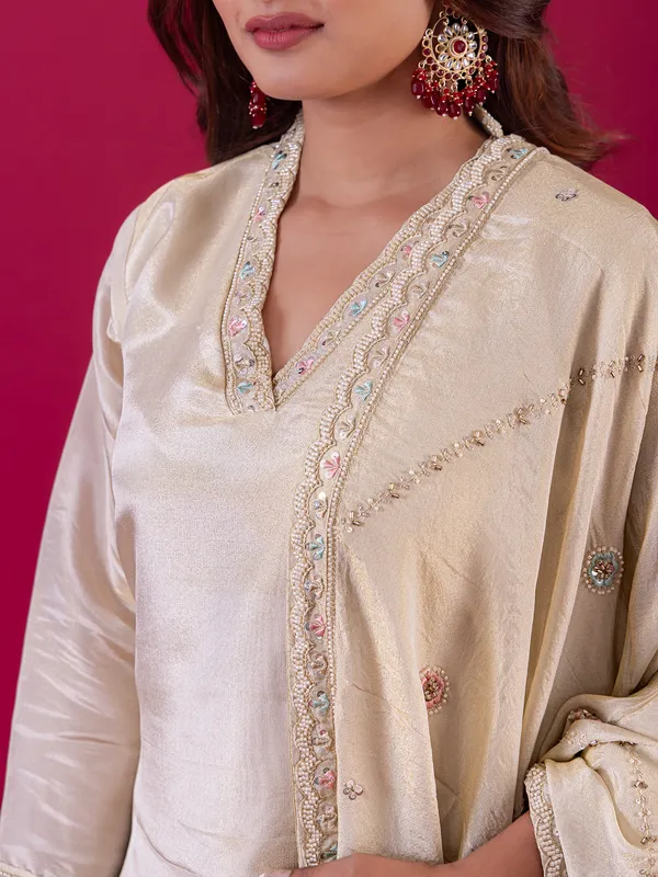 Cream pakistani silk palazzo suit for festival