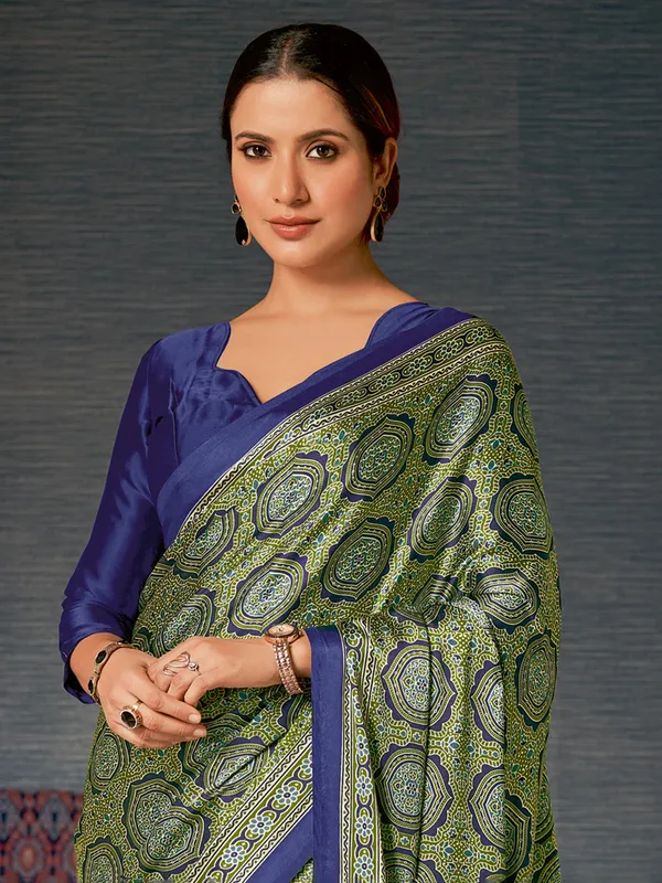 Blue and green printed crepe saree