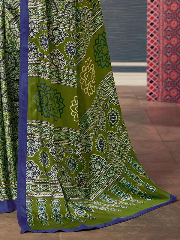 Blue and green printed crepe saree