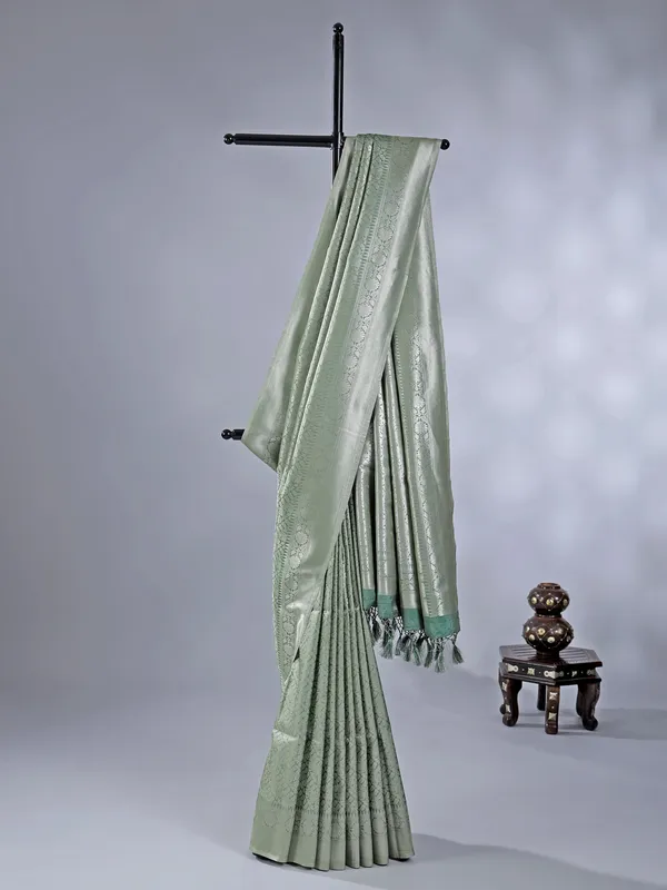 Pista green silk saree with zari weaving