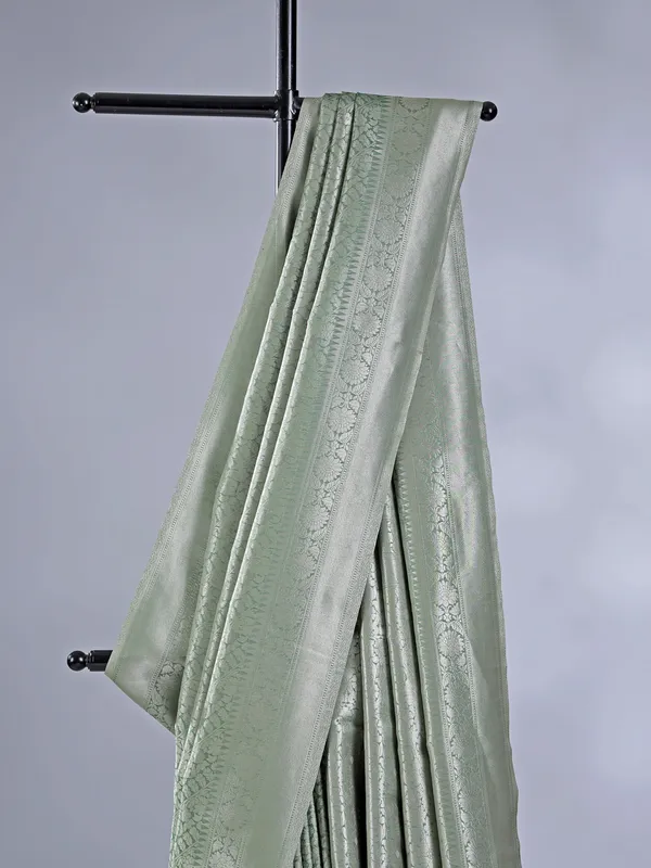 Pista green silk saree with zari weaving
