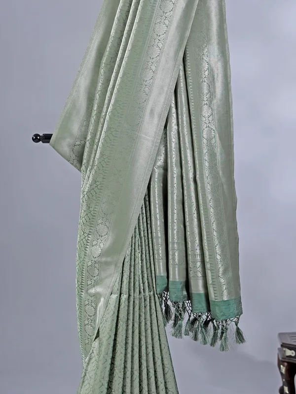 Pista green silk saree with zari weaving