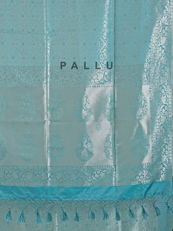 Sage green silk saree with subtle zari highlights