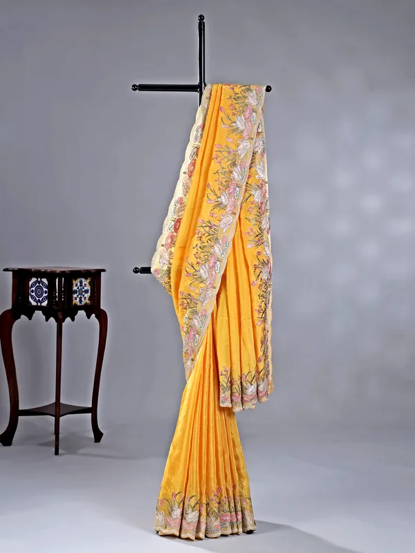 Yellow chinon saree with stone embroidery details