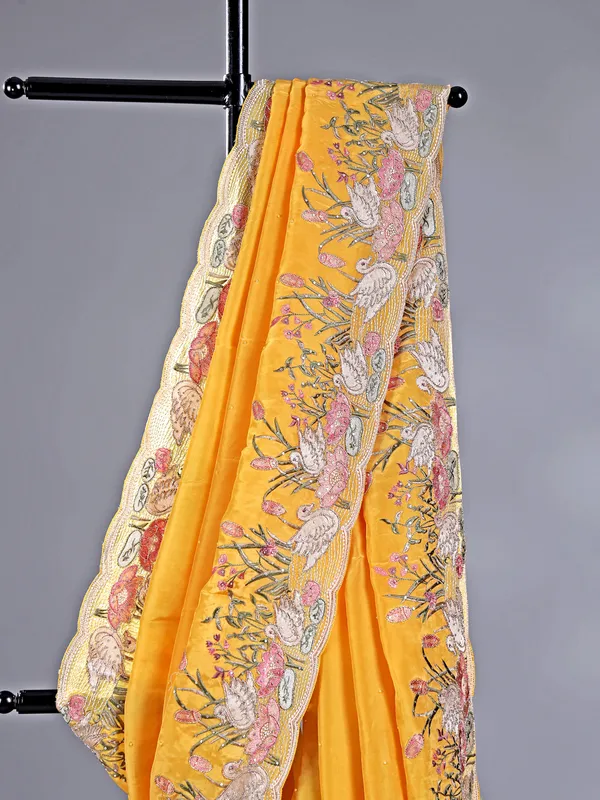 Yellow chinon saree with stone embroidery details