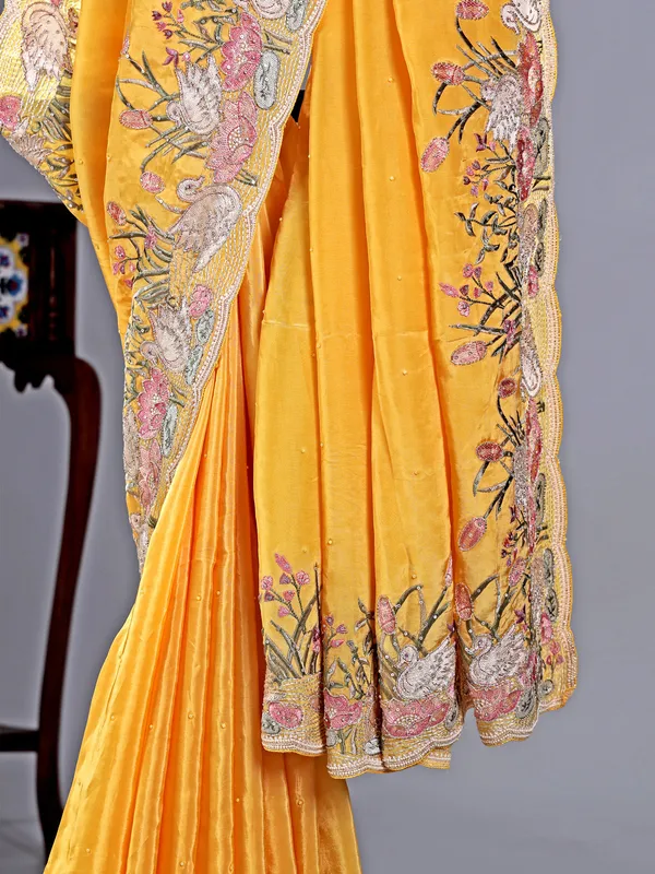 Yellow chinon saree with stone embroidery details