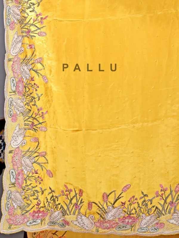 Yellow chinon saree with stone embroidery details