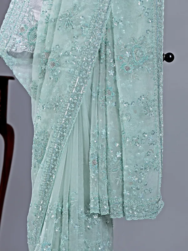 Light green organza saree with beaded detailing