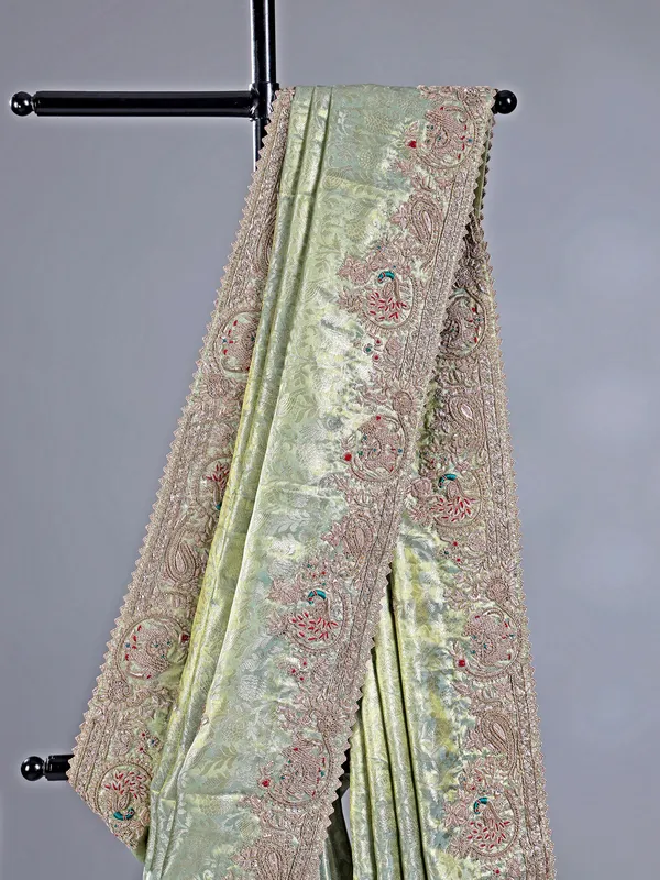 Pista green kanjivaram saree with grand embroidery