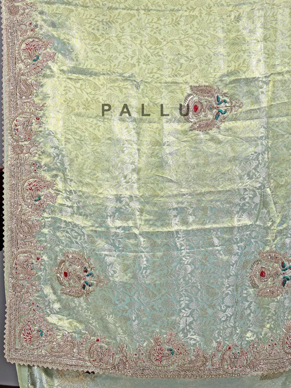 Pista green kanjivaram saree with grand embroidery