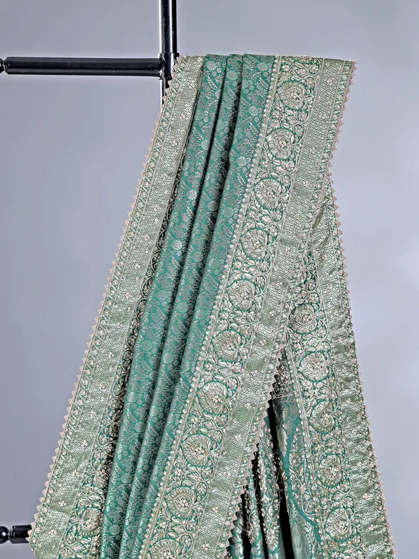Green kanjivaram saree with wedding embellishments