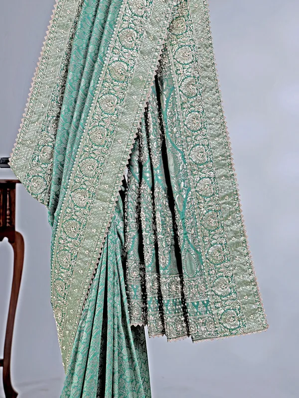 Green kanjivaram saree with wedding embellishments