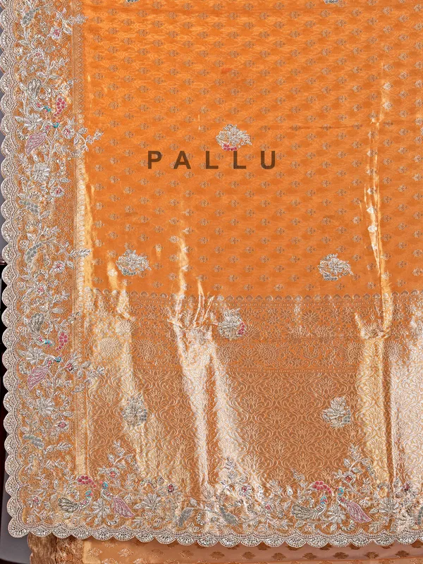 Pastel orange shimmer saree with festive glow