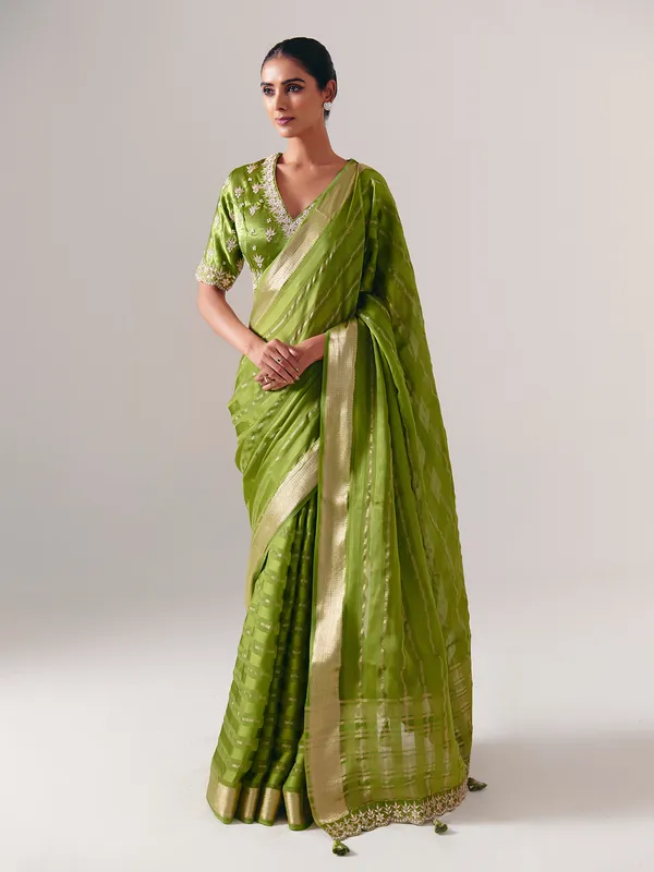 Green silk saree with heavy festive blouse