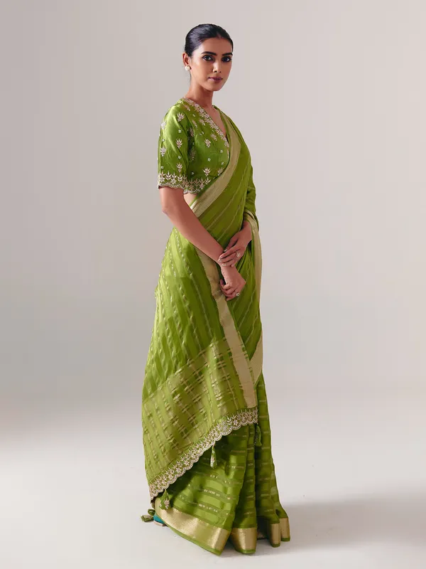 Green silk saree with heavy festive blouse