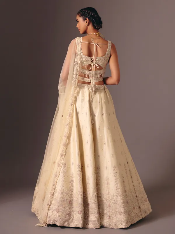 Cream raw silk bridal lehenga choli with sequins work