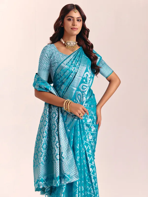 Aqua blue silk saree with exquisite zari work