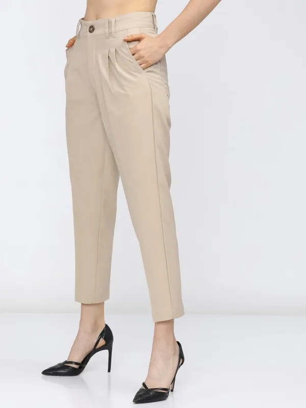  Tokyo Talkies Women Beige Solid Tapered Fit Casual Trousers