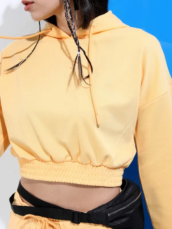  Tokyo Talkies Women Orange Solid Regular Hood Sweatshirts