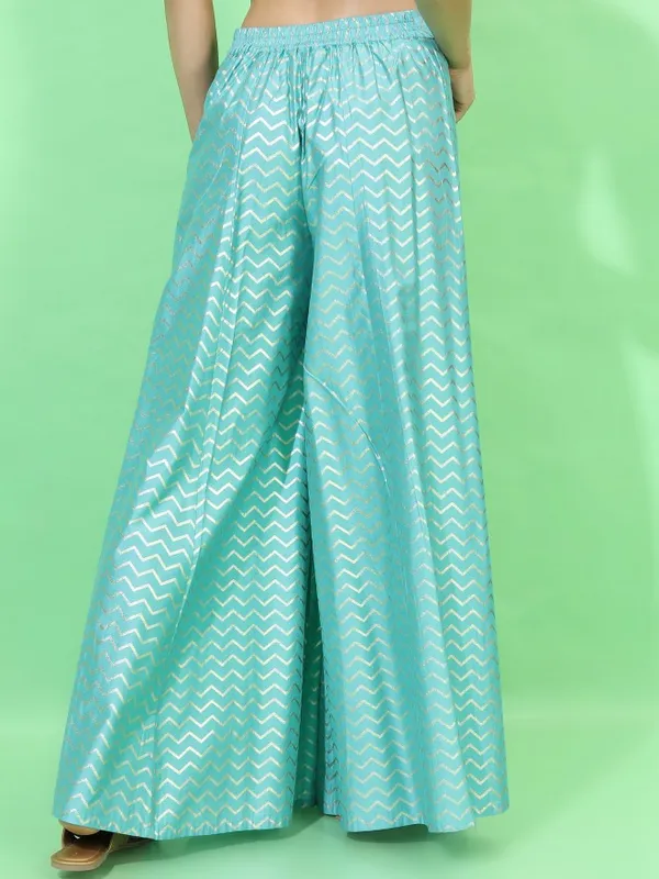  Vishudh Women Turquoise Printed Flared Palazzos