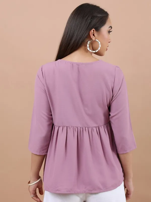 Embroidered Peplum Top