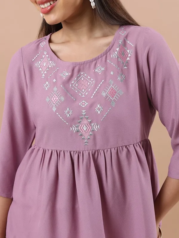 Embroidered Peplum Top