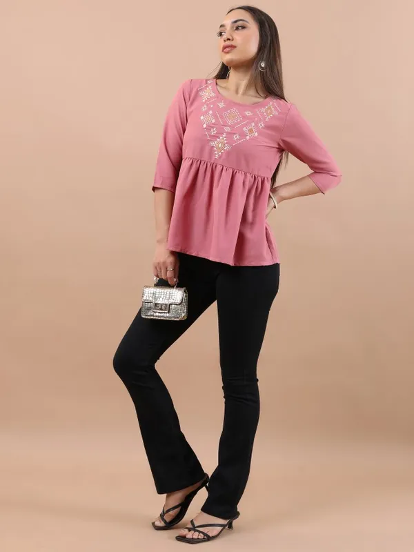 Embroidered Peplum Top