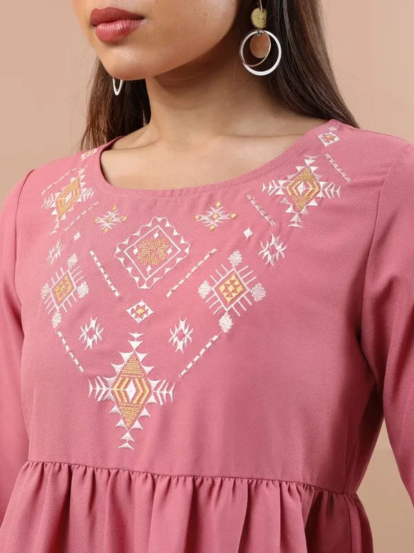 Embroidered Peplum Top